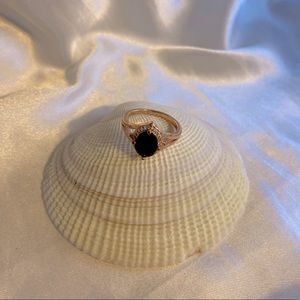 Rose Gold Ring with Black Gem Surrounded by diamonds, Size 7